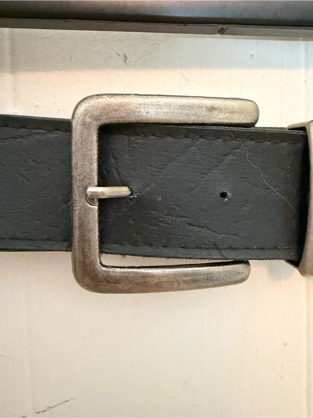 Unisex black belt with modern, brutalist silver buckle and details